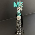 MIckey K black and teal Pen