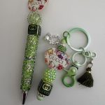 GG green gradient key chain and pen set.